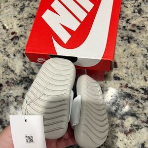 Brand new girl Nike slides